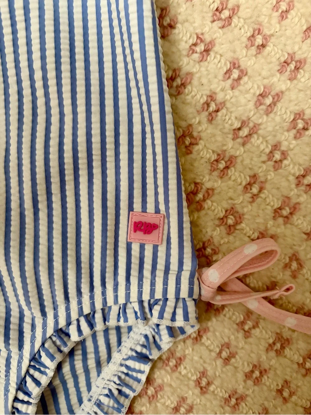 Ruffle Butts Blue & White Striped Long-Sleeve Rashguard with Pink Trim